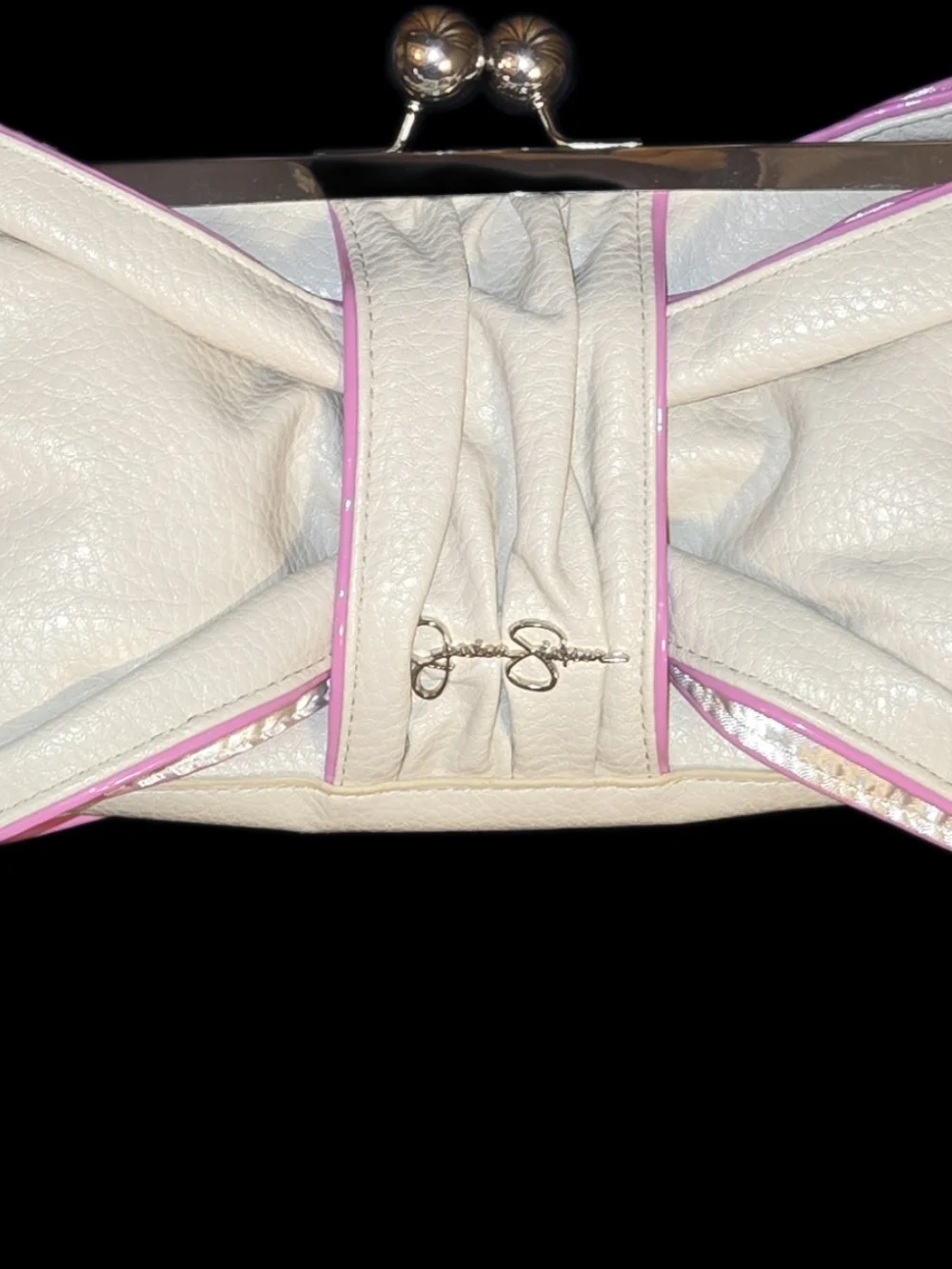 Elegant Cream Kiss-Lock Clutch with Pink Trim By Jessica Simpson. Flawless.
